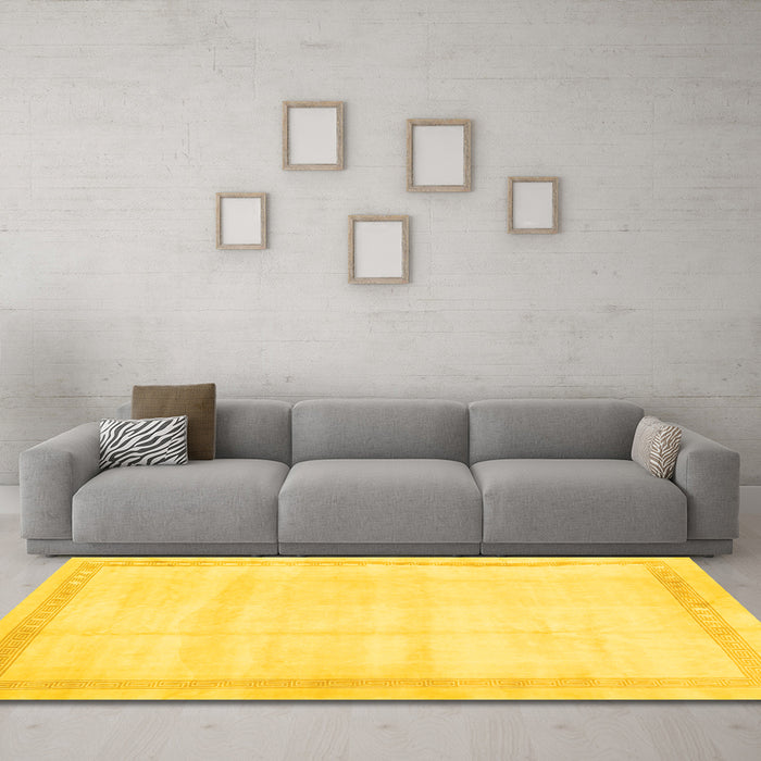 Machine Washable Solid Yellow Modern Rug in a Living Room, wshcon1886yw