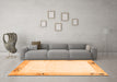 Machine Washable Solid Orange Modern Area Rugs in a Living Room, wshcon1888org