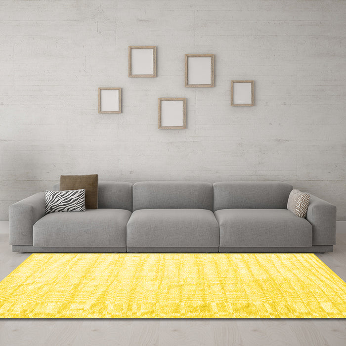 Machine Washable Solid Yellow Modern Rug in a Living Room, wshcon1892yw