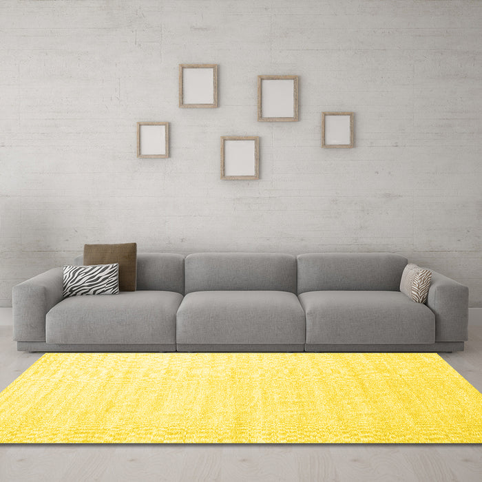 Machine Washable Solid Yellow Modern Rug in a Living Room, wshcon1894yw