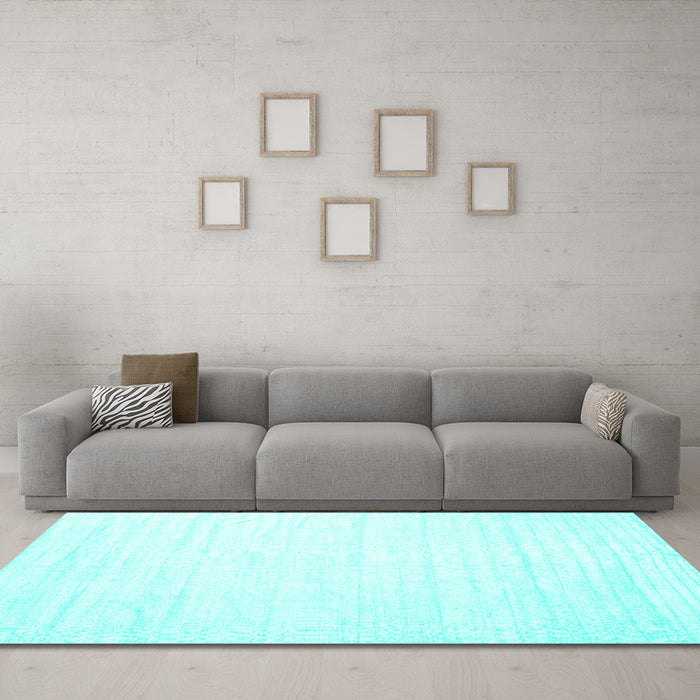 Machine Washable Solid Turquoise Modern Area Rugs in a Living Room,, wshcon1898turq