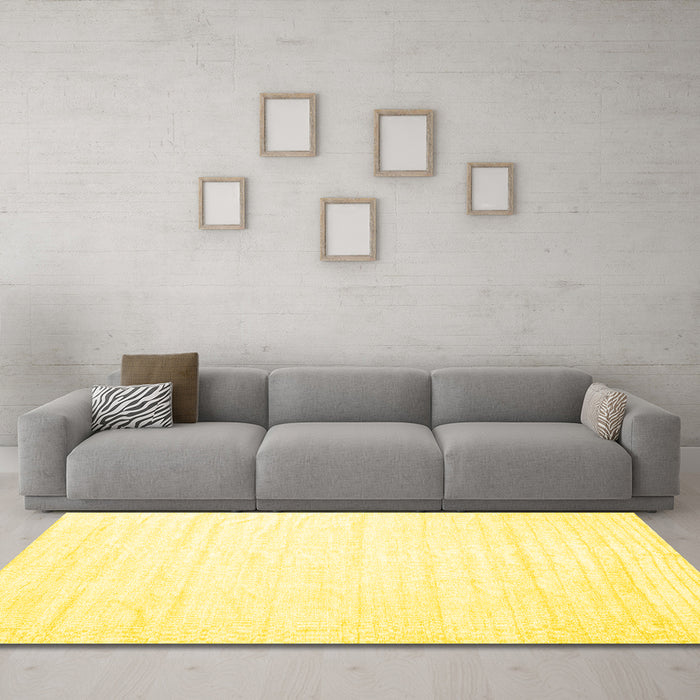 Machine Washable Solid Yellow Modern Rug in a Living Room, wshcon1898yw