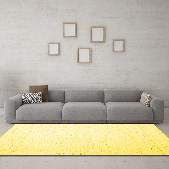 Machine Washable Solid Yellow Modern Rug in a Living Room, wshcon1899yw