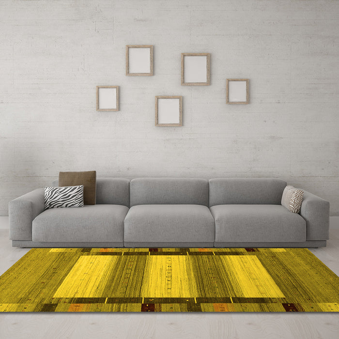 Machine Washable Abstract Yellow Contemporary Rug in a Living Room, wshcon1900yw
