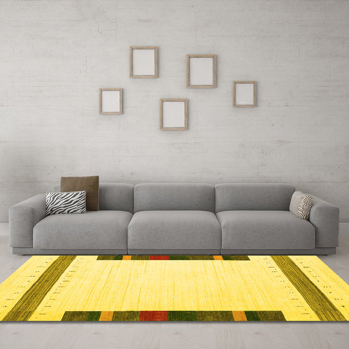 Machine Washable Solid Yellow Modern Rug in a Living Room, wshcon1901yw