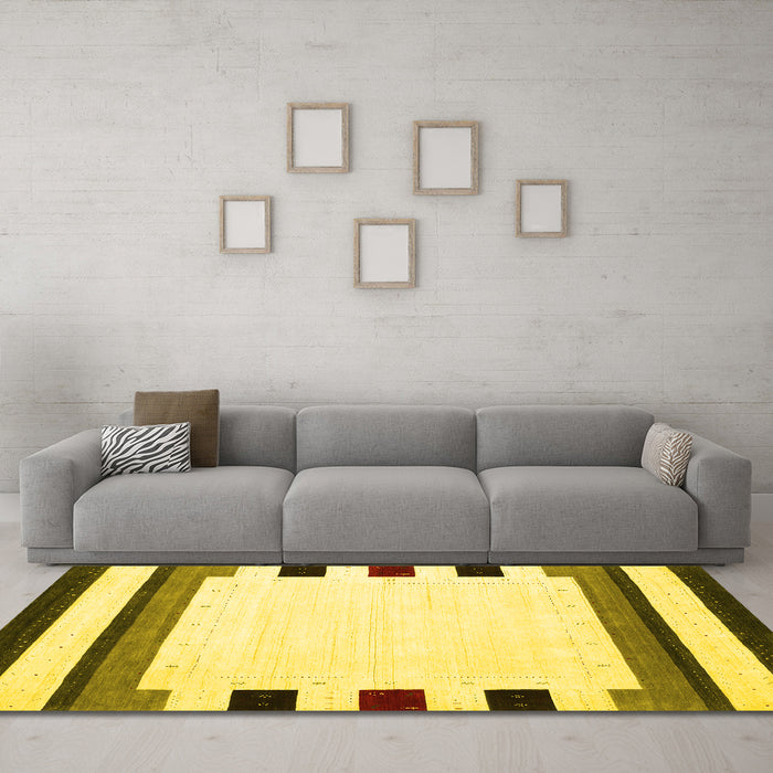 Machine Washable Solid Yellow Modern Rug in a Living Room, wshcon1907yw