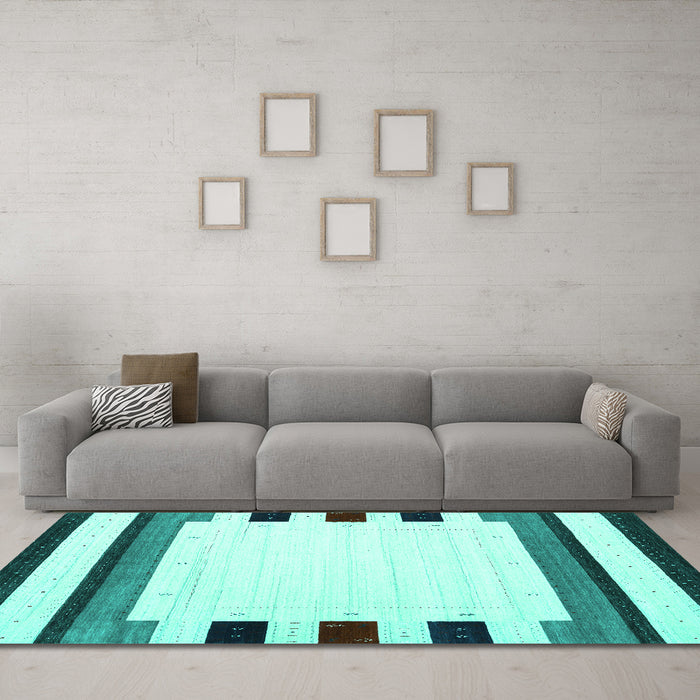 Machine Washable Solid Turquoise Modern Area Rugs in a Living Room,, wshcon1912turq