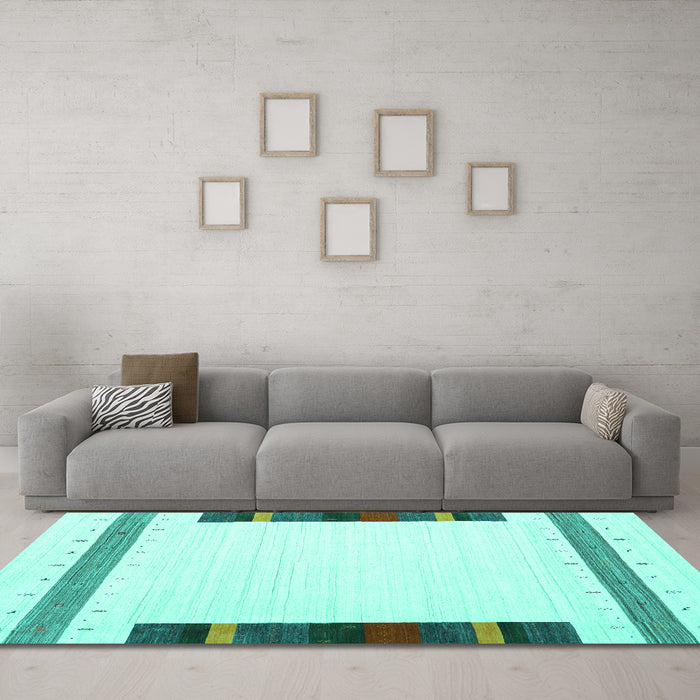 Machine Washable Solid Turquoise Modern Area Rugs in a Living Room,, wshcon1916turq