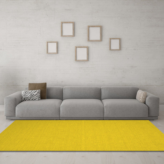 Machine Washable Solid Yellow Modern Rug in a Living Room, wshcon191yw