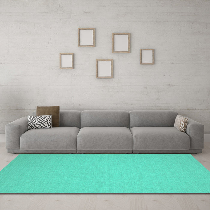 Machine Washable Solid Turquoise Modern Area Rugs in a Living Room,, wshcon191turq