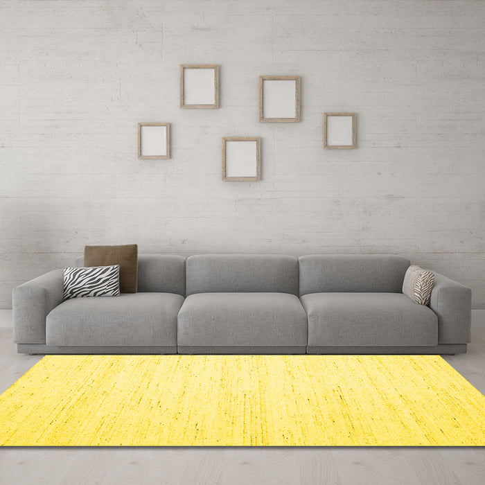 Machine Washable Solid Yellow Modern Rug in a Living Room, wshcon1924yw
