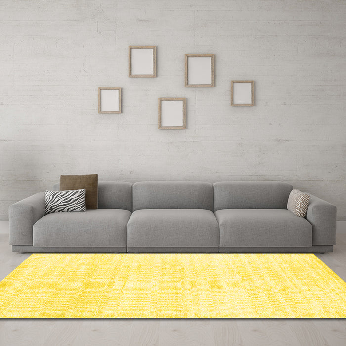 Machine Washable Solid Yellow Modern Rug in a Living Room, wshcon1925yw