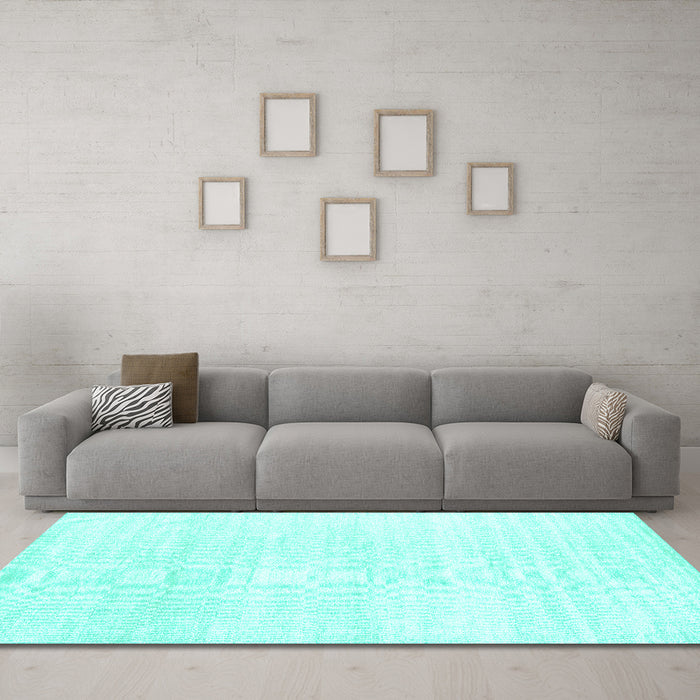 Machine Washable Solid Turquoise Modern Area Rugs in a Living Room,, wshcon1925turq