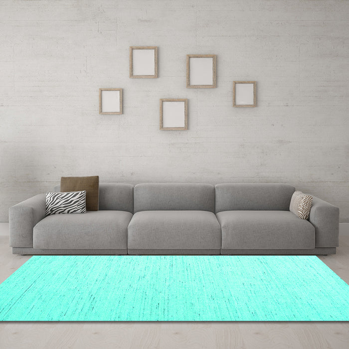 Machine Washable Solid Turquoise Modern Area Rugs in a Living Room,, wshcon1929turq