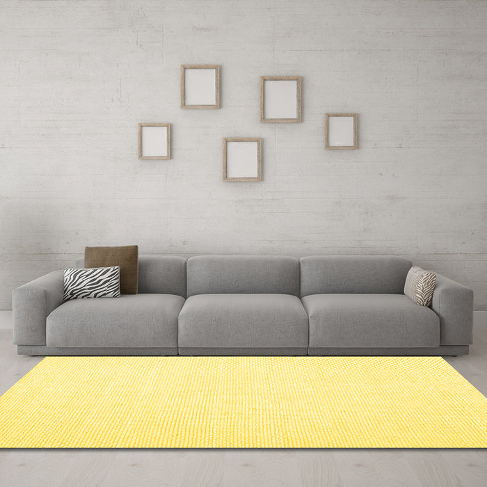 Machine Washable Solid Yellow Modern Rug in a Living Room, wshcon1930yw