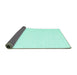 Sideview of Solid Turquoise Modern Rug, con1930turq