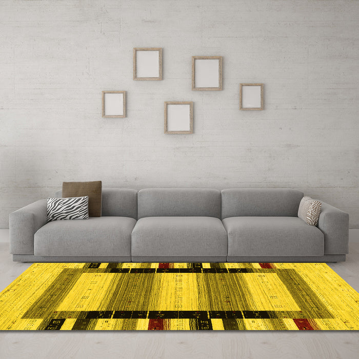 Machine Washable Solid Yellow Modern Rug in a Living Room, wshcon1944yw