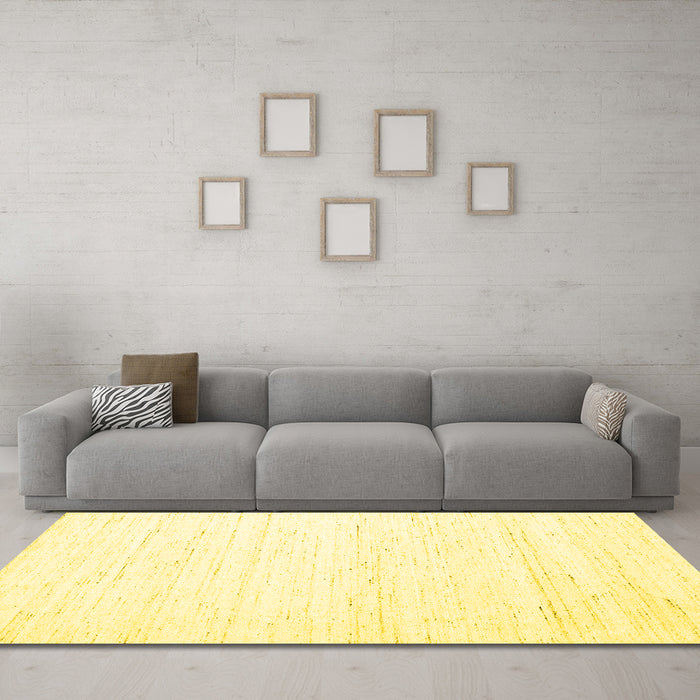 Machine Washable Solid Yellow Modern Rug in a Living Room, wshcon1945yw