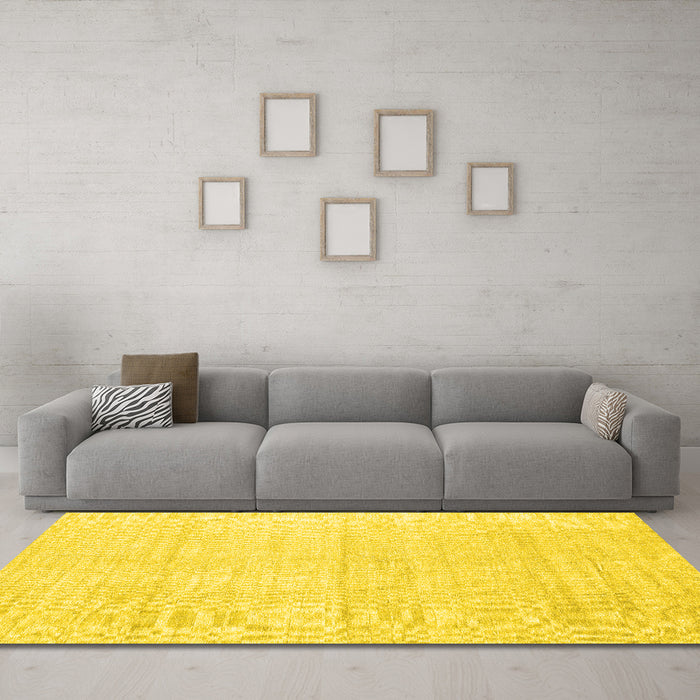 Machine Washable Solid Yellow Modern Rug in a Living Room, wshcon1947yw