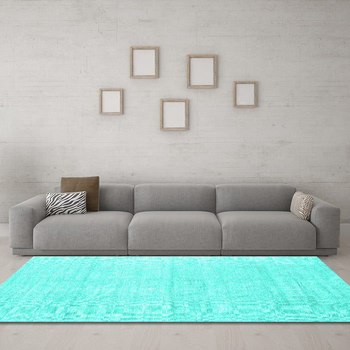 Machine Washable Solid Turquoise Modern Area Rugs in a Living Room,, wshcon1947turq