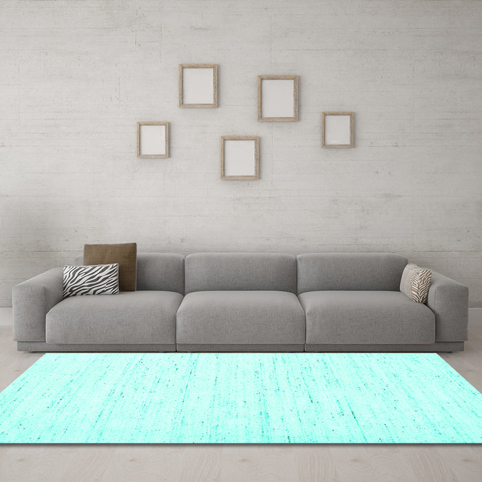 Machine Washable Solid Turquoise Modern Area Rugs in a Living Room,, wshcon1952turq