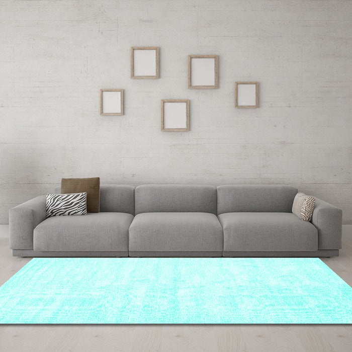 Machine Washable Solid Turquoise Modern Area Rugs in a Living Room,, wshcon1956turq