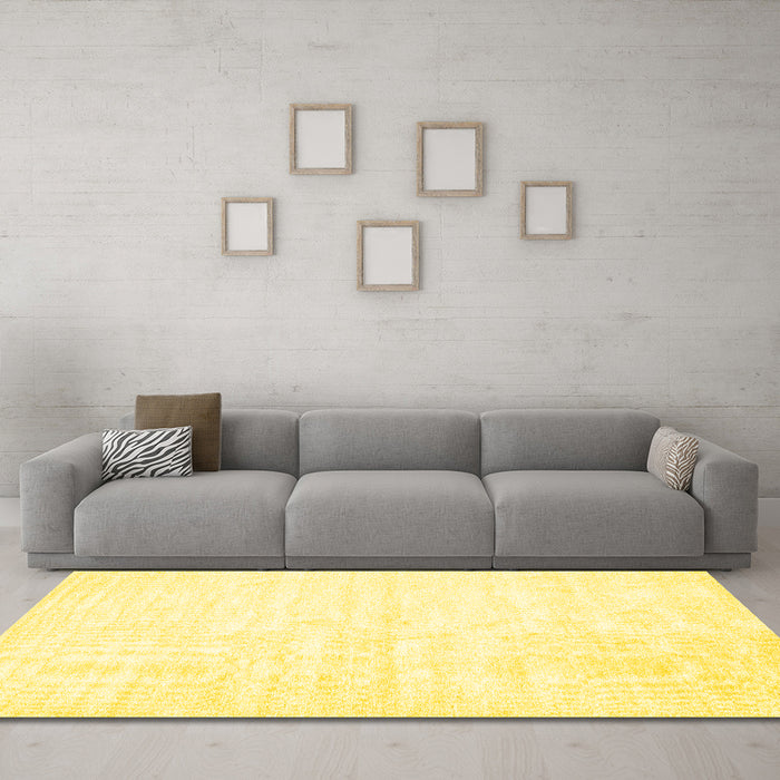 Machine Washable Solid Yellow Modern Rug in a Living Room, wshcon1956yw