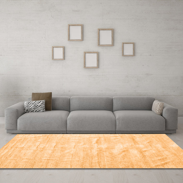 Machine Washable Solid Orange Modern Area Rugs in a Living Room, wshcon1960org