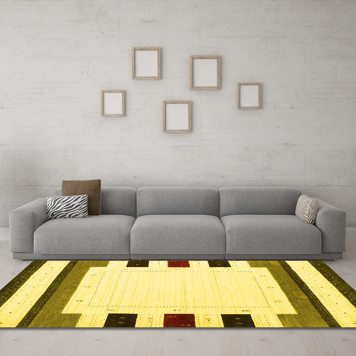 Machine Washable Solid Yellow Modern Rug in a Living Room, wshcon1963yw