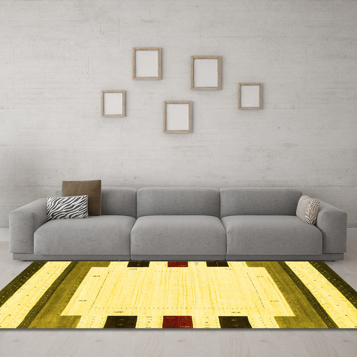 Machine Washable Solid Yellow Modern Rug in a Living Room, wshcon1971yw