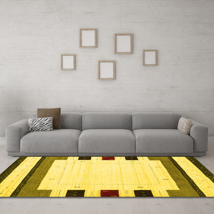 Machine Washable Solid Yellow Modern Rug in a Living Room, wshcon1972yw