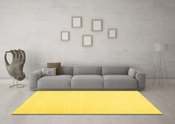 Machine Washable Solid Yellow Modern Rug in a Living Room, wshcon1981yw