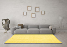 Machine Washable Solid Yellow Modern Rug in a Living Room, wshcon1983yw