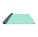 Sideview of Solid Turquoise Modern Rug, con1983turq