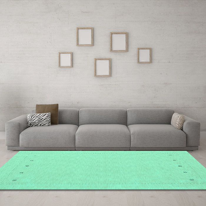 Machine Washable Solid Turquoise Modern Area Rugs in a Living Room,, wshcon2020turq
