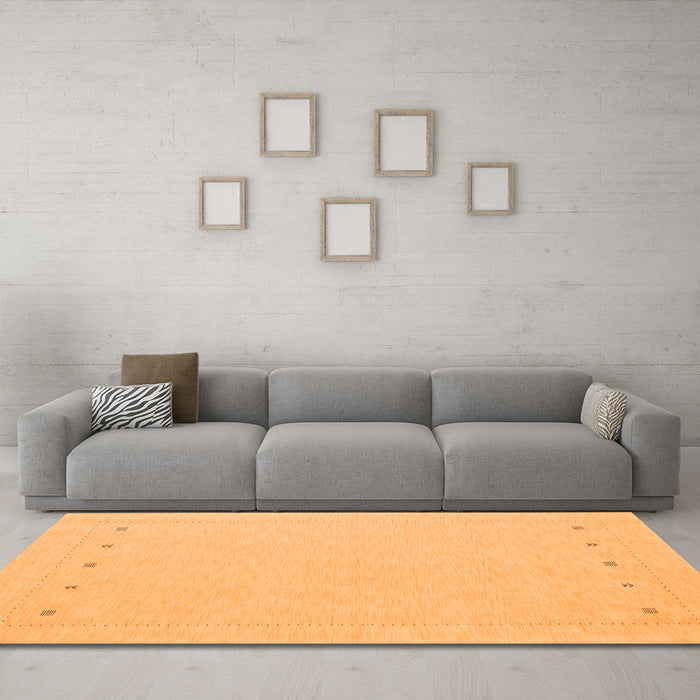 Machine Washable Solid Orange Modern Area Rugs in a Living Room, wshcon2020org