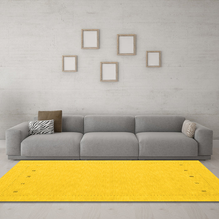 Machine Washable Solid Yellow Modern Rug in a Living Room, wshcon2020yw