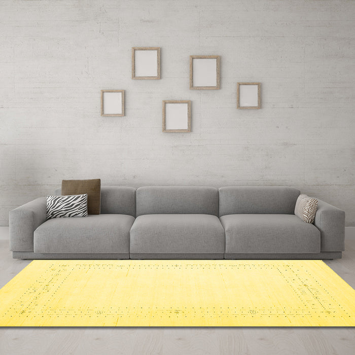 Machine Washable Solid Yellow Modern Rug in a Living Room, wshcon2024yw