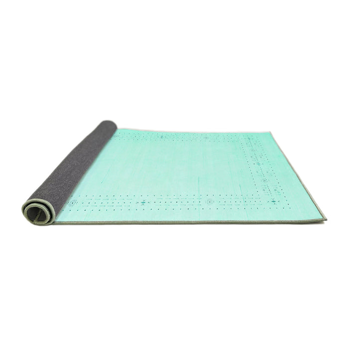 Sideview of Solid Turquoise Modern Rug, con2024turq