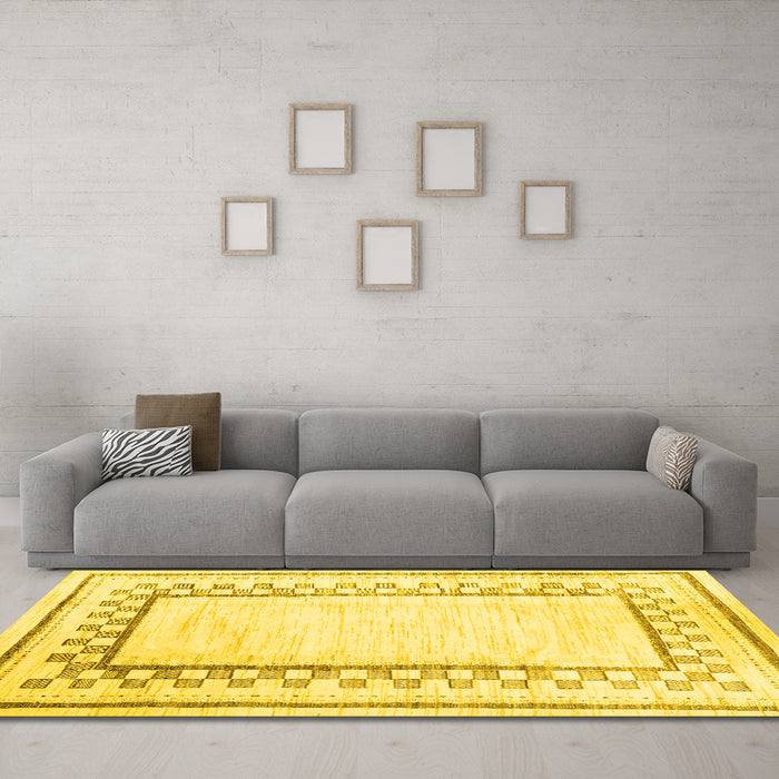 Machine Washable Solid Yellow Modern Rug in a Living Room, wshcon2035yw