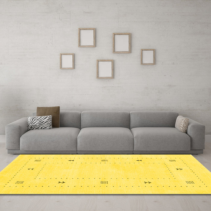 Machine Washable Solid Yellow Modern Rug in a Living Room, wshcon2038yw