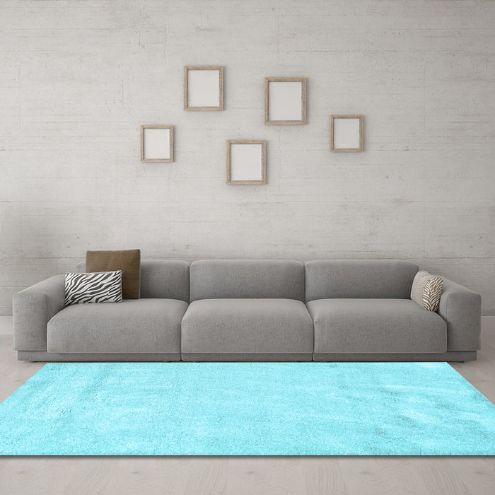 Machine Washable Solid Light Blue Modern Rug in a Living Room, wshcon2054lblu