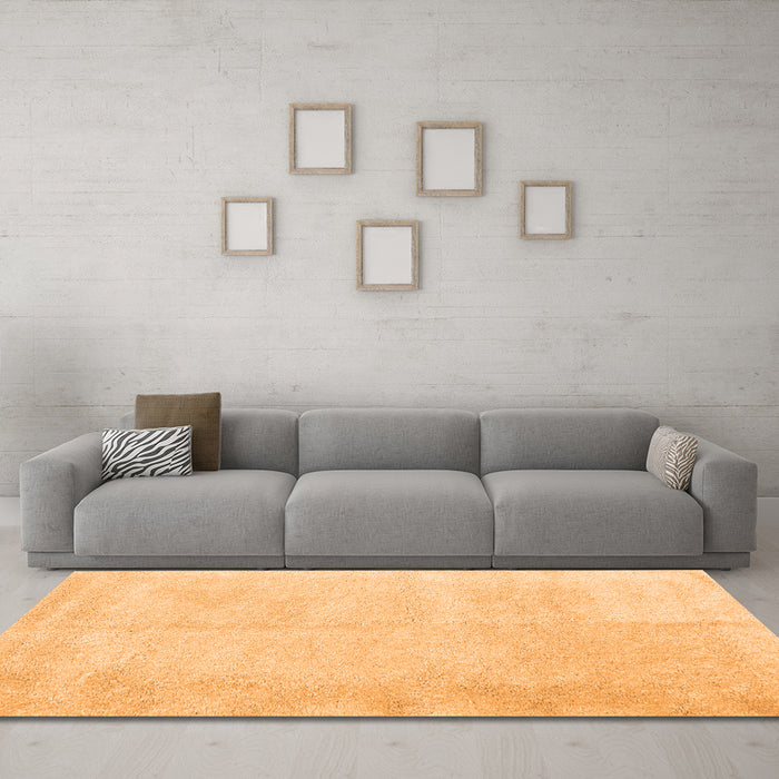 Machine Washable Solid Orange Modern Area Rugs in a Living Room, wshcon2055org