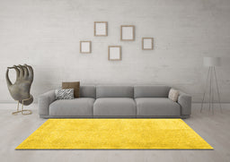 Machine Washable Solid Yellow Modern Rug in a Living Room, wshcon2055yw
