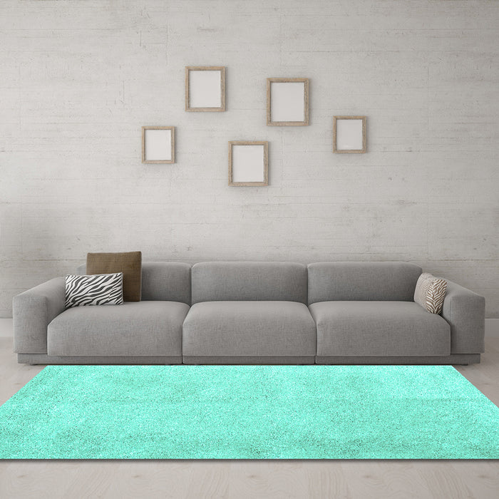 Machine Washable Solid Turquoise Modern Area Rugs in a Living Room,, wshcon2055turq