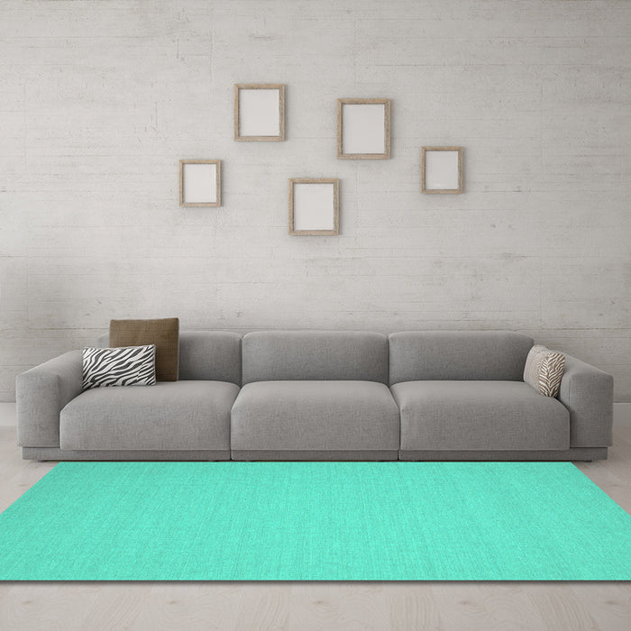 Machine Washable Solid Turquoise Modern Area Rugs in a Living Room,, wshcon207turq