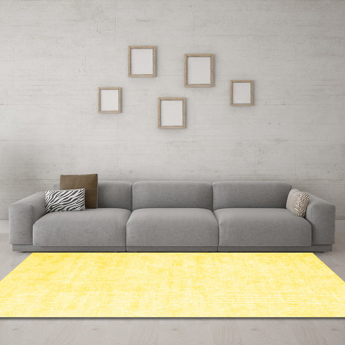 Machine Washable Solid Yellow Modern Rug in a Living Room, wshcon2093yw