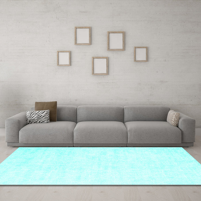 Machine Washable Solid Turquoise Modern Area Rugs in a Living Room,, wshcon2093turq