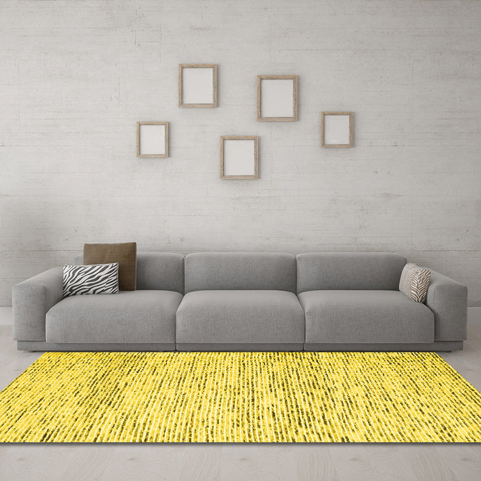 Machine Washable Solid Yellow Modern Rug in a Living Room, wshcon2095yw