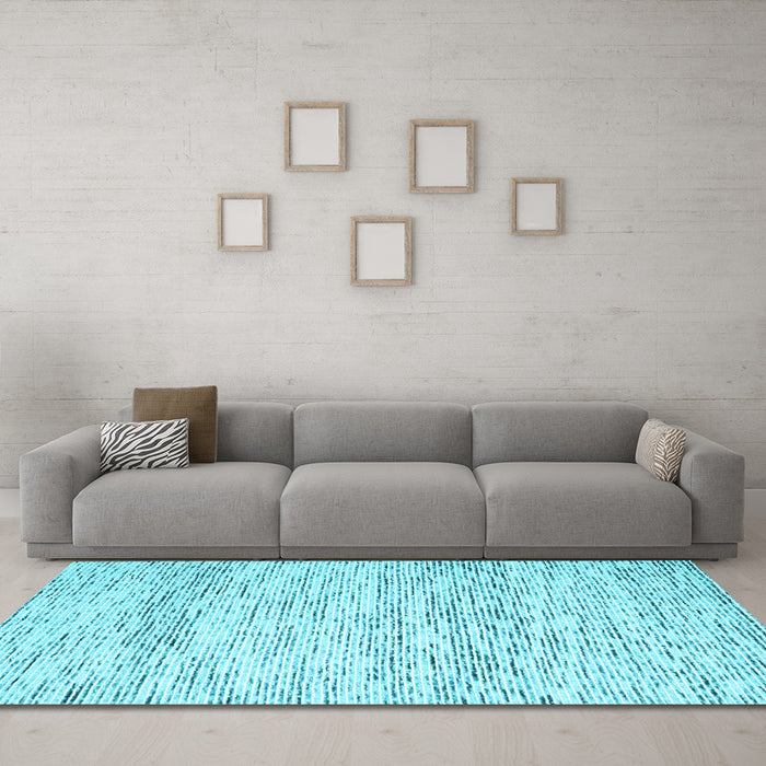 Machine Washable Solid Light Blue Modern Rug in a Living Room, wshcon2095lblu
